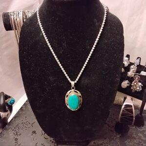 Sterling Silver Turquoise Pendant On A Sterling Silver Twisted Link Necklace 19"